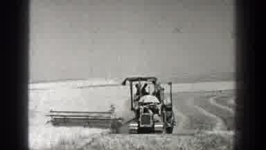California (1936): The Tractor Is Moving Slowly Plowing The Fields Getting Them