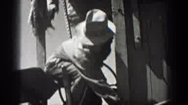 California (1936): Black And White Video Of Men Operating A Heavy Farming Machine
