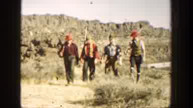 Rifles on a bright sunny day? That's a weird way to 'shoot' hoops!