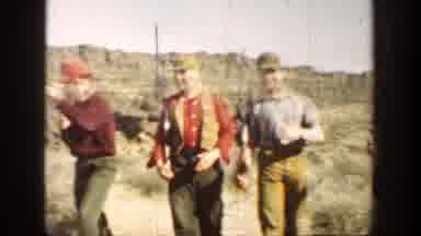 California (1936): Several Men In Uniforms And Caps And Big Hunting Rifles In The