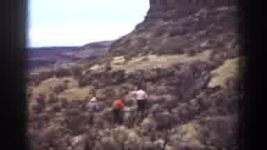 California (1936): People Walking Through A Vast Green Area Of Mountains