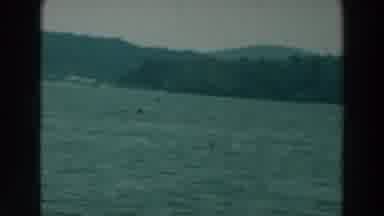 Lake Winnebago Wisconsin-1964: A Big Blue Lake Surrounded By Mountains And Many Trees