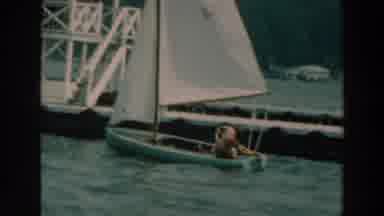 Lake Winnebago Wisconsin-1964: Man Sailing On A Small Boat In The Sea With