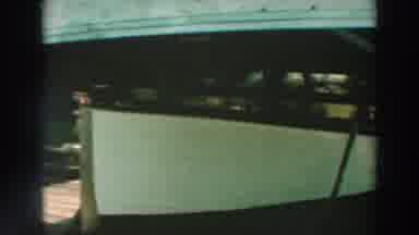Lake Winnebago Wisconsin (1964): View Of White Boat Stored Under Wooden Pier On A