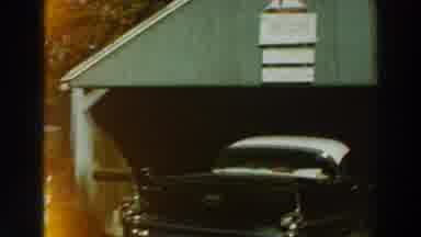 Lake Winnebago Wisconsin (1964): A Black And White Vintage Car With Fender Fins Is