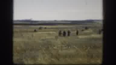 Kansas (1958): Five Hunters Standing In A Windy Field Holding Large Guns Wearing