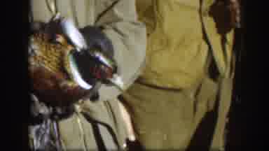 Kansas (1958): Armed Hunters Smoking And Holding Animals In The Bush
