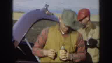 Kansas (1958): Hunters Opening Bottles Of Drink In The Trunk Of A Car With