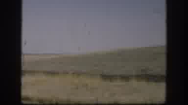 Kansas (1958): Clay Road And Green Landscape View