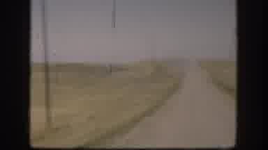 Kansas (1958): Farmer Works Hard In Open Fields To Reach For Something He May Have