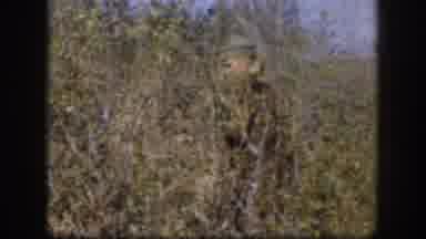 Kansas (1958): Hunters Through The Bushes With Their Shotgun At The Ready Looking