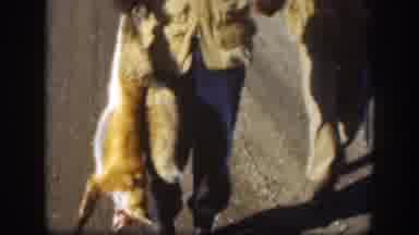 Kansas (1958): Two Men Talking Dressed In Jackets And Red Caps Hunting A Fox In A