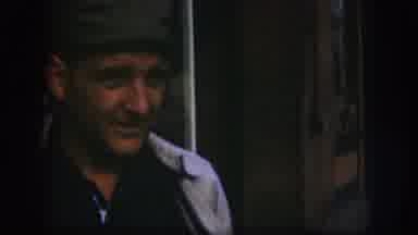 Kansas (1958): Strange Man Wearing A Pea coat