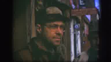 Kansas (1958): Man Wearing Tan Hat And Glasses Looks At Camera On A Clear Day
