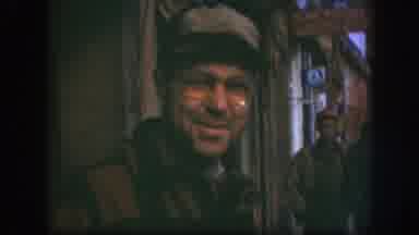 Kansas (1958): Man Wearing Brown Hat And Glasses Smiles At Camera On A Clear Day