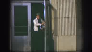 Kansas (1958): Men Exiting A Building