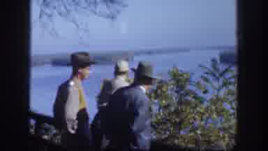Kansas (1958): The Three Men In Hats Stand Facing Away From The Camera And Take In