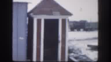 Kansas (1958): View Of Small Brown Shed And Multicolored Boys Foundation Title