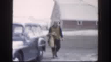 Kansas (1958): Man In A Hat Walking Towards The Car Opening The Door With House In
