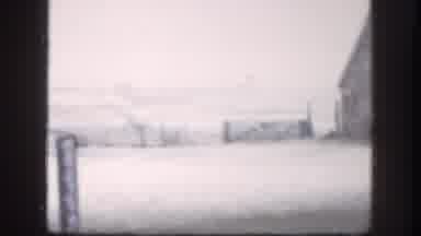 Kansas (1958): Open Farm Land With Large Barn And Men Who Are Farmers