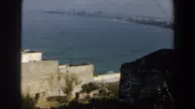 Israel (1960): View Of White Bell Tower And Blue Sea On A Cloudy Day