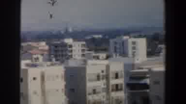 Israel (1960): Panning View Of City Center Buildings And Town Outside Outdoors In