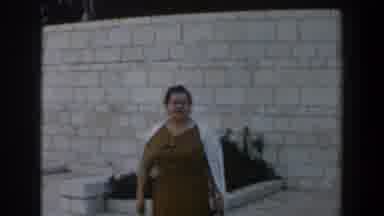 Israel (1960): Woman Wearing Brown Dress Poses For A Picture