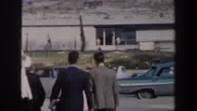 Israel (1960): Vintage Film Showing Four Men Walking A Street With Arid Climate