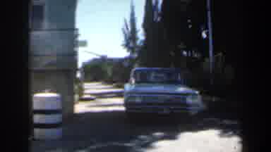 Israel (1960): A Street With A Moving Car And Van Crossing A Check Post Or Gate
