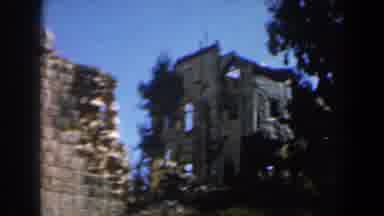 Israel (1960): View Of Grey Stone Structure And Tree Against Blue Sky On A Clear