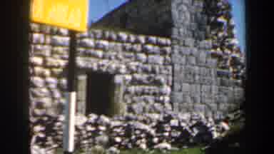 Israel (1960): Man Standing In Front Of Tourist Park With Structures Made With