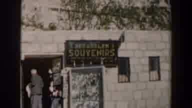 Israel (1960): Tourists Visit A Souvenir Shop It Seems Like A Low-Income Store Or