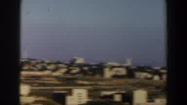 Israel (1960): Sweeping View Of Tan Buildings And Green Trees On A Sunny Day