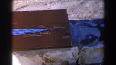 Israel (1960): Brown Box On Stone Wall Presumably Near A Beach