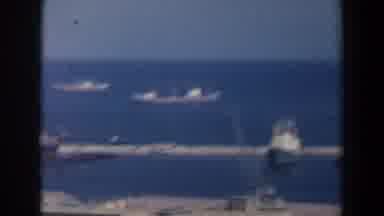 Israel (1960): Several Boats Docked In A Marina At A Busy Port