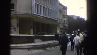Israel (1960): People Walk Near White Multi-Story Building You See A Common Traci