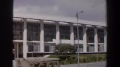 Israel-1960: Modernist Building With Yellow Bus And Military Jeep