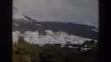 Israel (1960): View Of Snow Covered Mountains Green Trees And Large Puffy Clouds