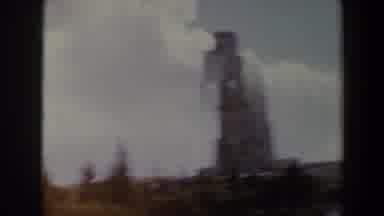 Israel (1960): A Rock Structure Stands On Top Of A Mountain Surrounded By Forest