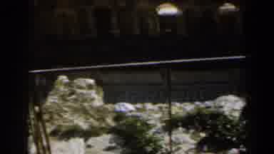 Israel (1960): Camera Viewing Of An Old Iron Fence And Its Surrounding Buildings