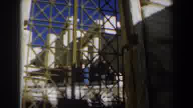 Israel (1960): View Of Brown Iron Gate Against Blue Sky On A Sunny Day