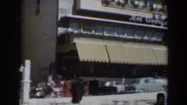 Israel (1960): Several Cars On The Street And People Walking Normally With