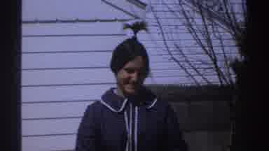 Michigan (1969): Girl With Weird Ponytail Throwing Ball