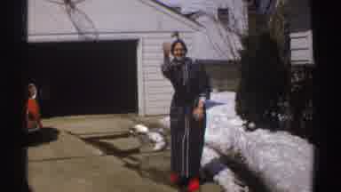 Michigan (1969): A Woman In Her Robe Slippers And A Ponytail Is Pretending To Bowl