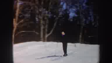 Vermont (1962): Tall Man In Black Dress Skiing In The Snow Of A Mountain