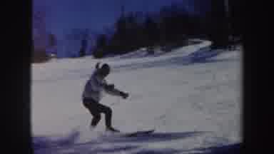 Vermont (1962): Person Wearing White Jacket Stops Skiing On A Sunny Day