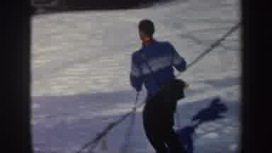 Vermont (1962): Man With Blue Shirt Skiing On Snow During The Day