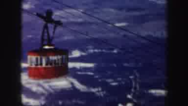Vermont (1962): Red Cable Car Makes Its Slow Journey Through The Icy Mountains