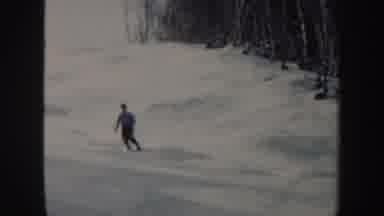 Vermont (1962): Person Wearing Blue Shirt Skis Downhill On A Clear Sunny Day