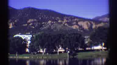 Colorado (1969): View Of Brown Mountains Blue Sky And White Building Shielded By